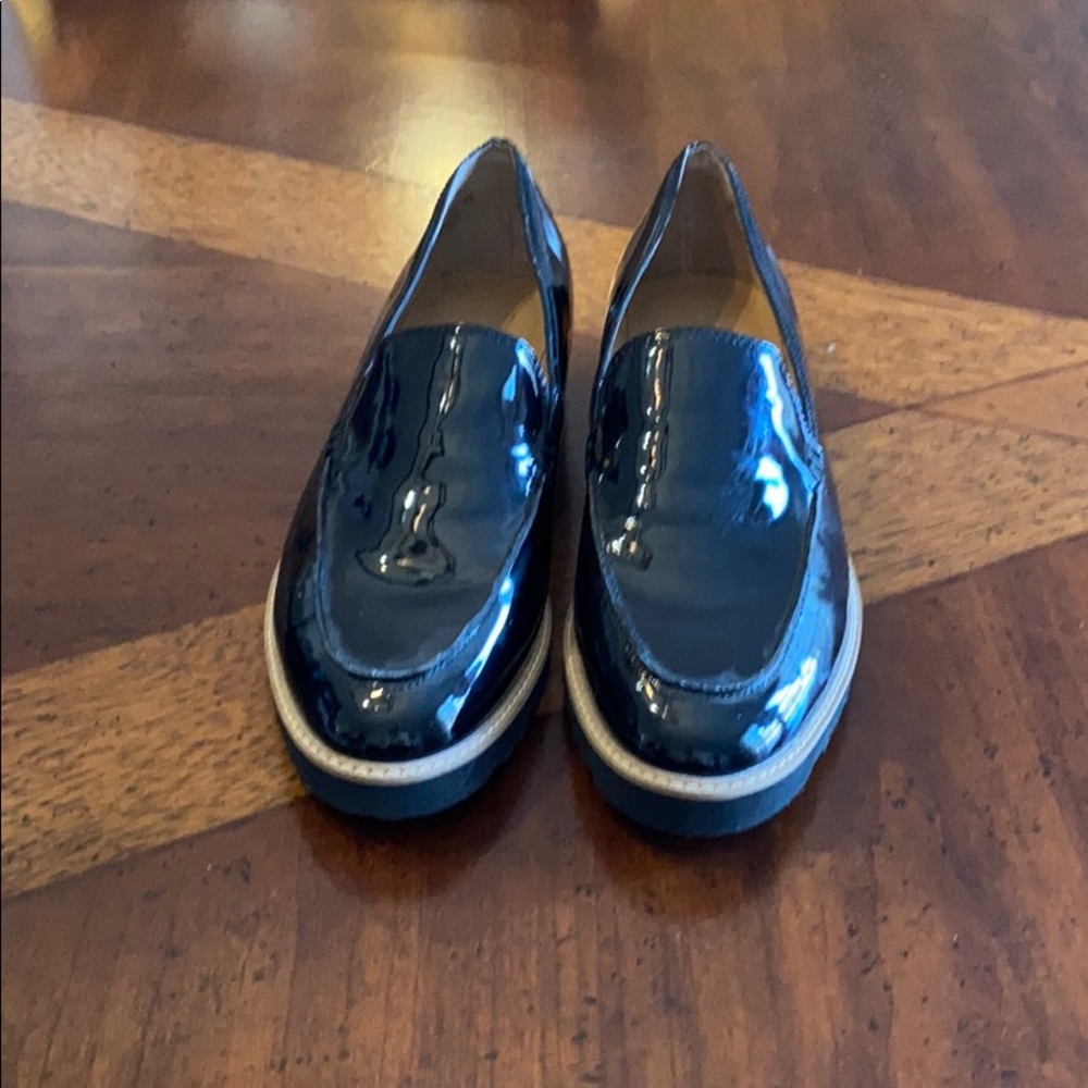 Patent leather loafers.